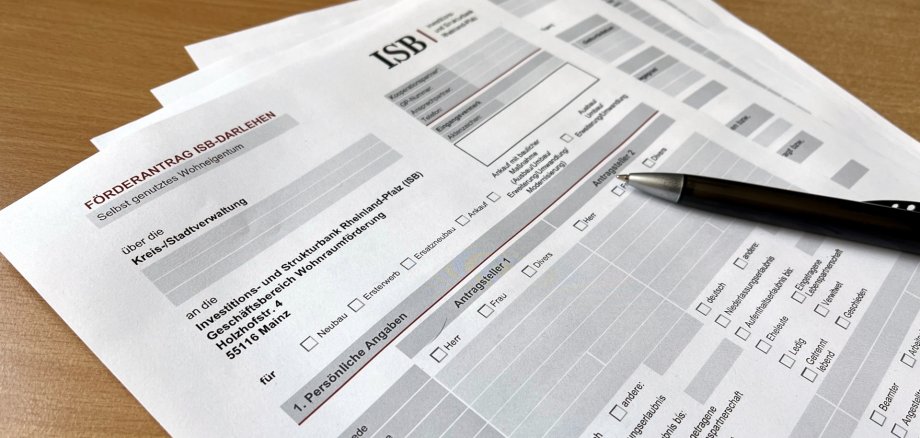 The photo shows the form for an ISB funding application.